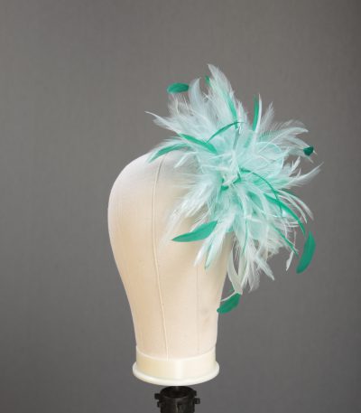 Ladies wedding or races aqua and emerald green small feather and satin loop fascinator hat