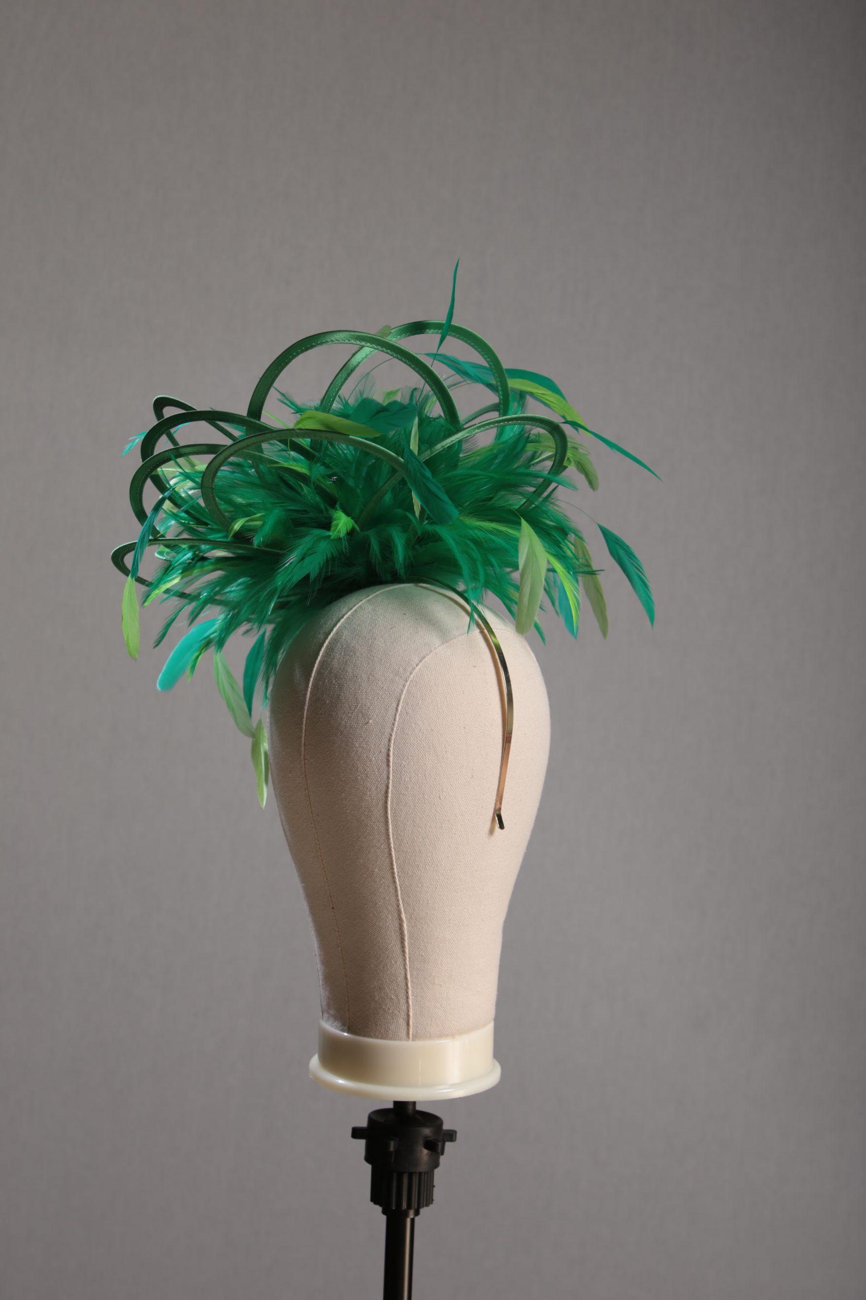 Ladies formal Emerald Green and Lime medium feather and satin loop fascinator hat. Suitable for a wedding or ladies day at the races