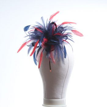 navy blue and red small hackle fascinator hat with feathers set on a headband