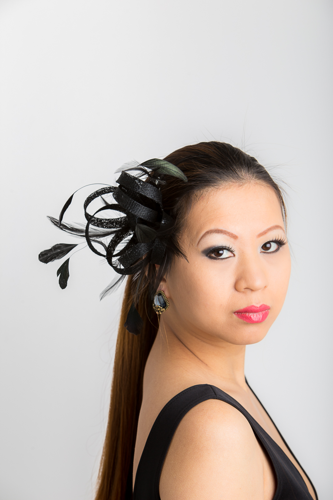 Black small sinamay and feather fascinator hat