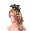 yellow halo crown with crin and black feather tree