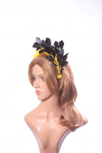 yellow halo crown with crin and black feather tree