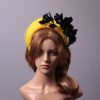 yellow halo crown with crin and black feather tree