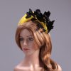 yellow halo crown with crin and black feather tree