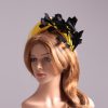 yellow halo crown with crin and black feather tree