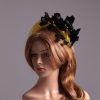 yellow halo crown with crin and black feather tree