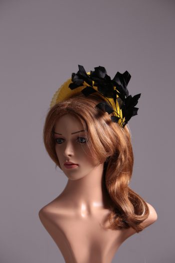 yellow halo crown with crin and black feather tree