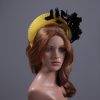 yellow halo crown with crin and black feather tree