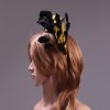 yellow halo crown with crin and black feather tree