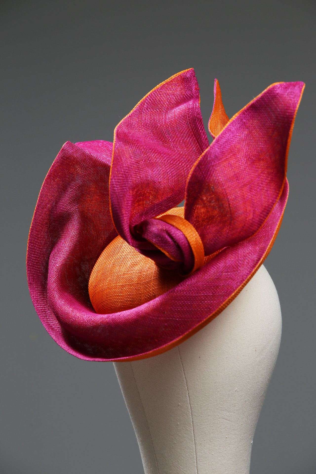 Hot pink and Orange Saucer twisted set on a button fascinator base hat (3) Hot Pink sinamay saucer hat set on a orange button pillbox fascinator