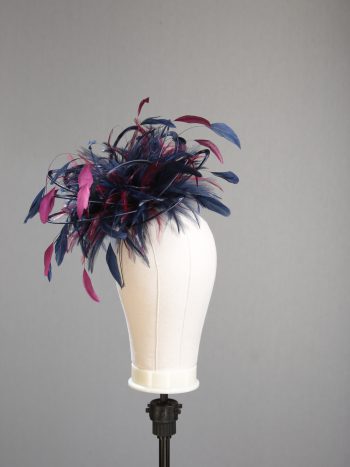 Ladies' formal Navy Blue and Burgundy Wine medium feather and satin loop fascinator hat. Suitable for a wedding or ladies' day at the races