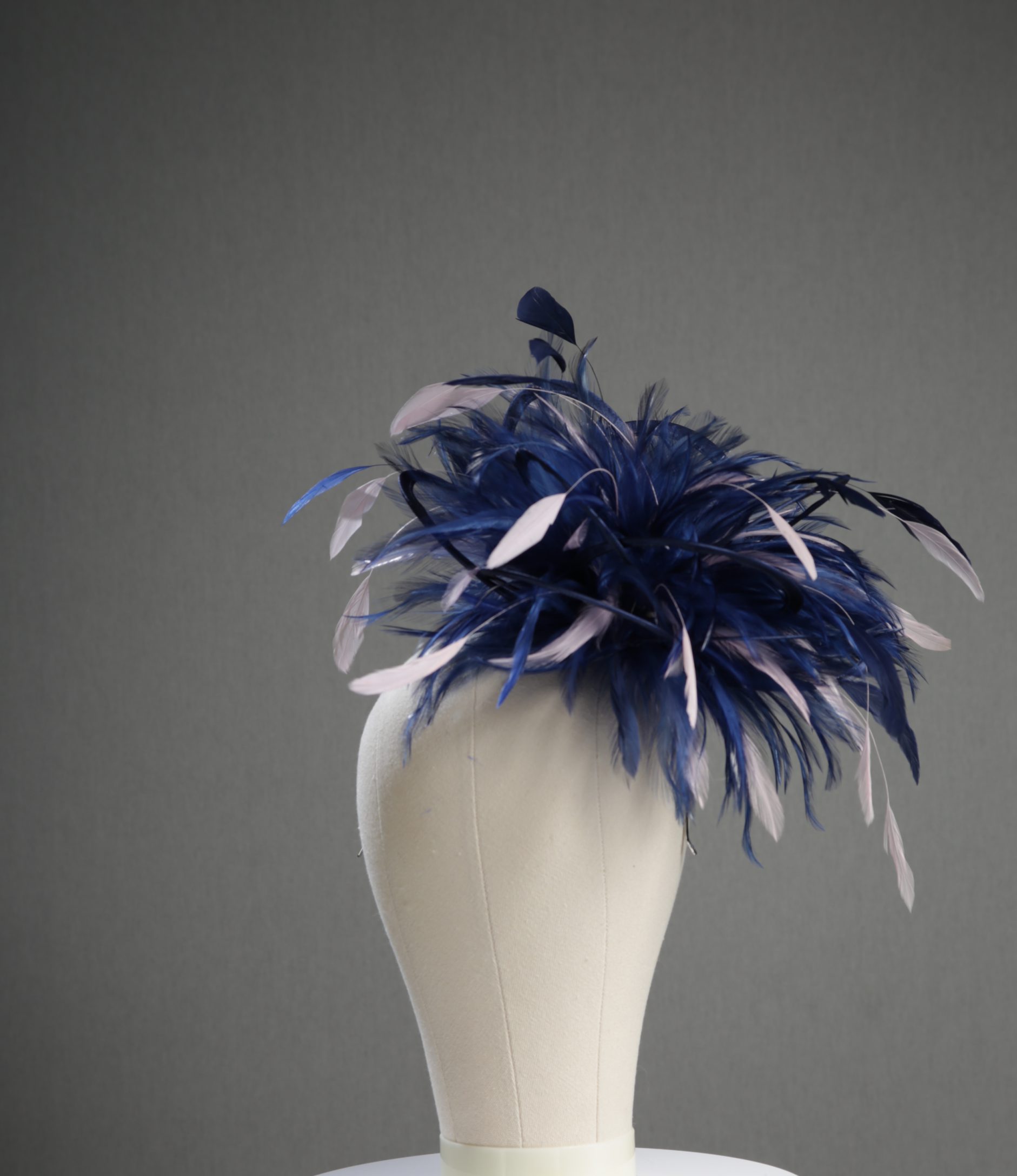 Ladies formal Navy Blue and Baby Pink medium feather and satin loop fascinator hat. Suitable for a wedding or ladies day at the races