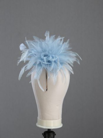 Ladies wedding or races baby blue small feather and satin loop fascinator hat