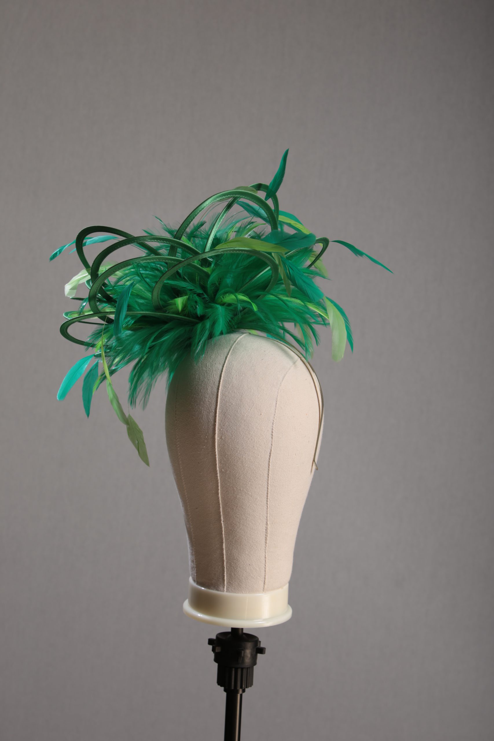 Ladies formal Emerald Green and Lime medium feather and satin loop fascinator hat. Suitable for a wedding or ladies day at the races