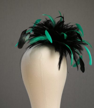 Ladies wedding or races black and emerald green small feather and satin loop fascinator hat