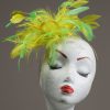 yellow and lime green small feather fascinator hat