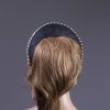 black sinamay halo crown for a wedding or the races