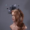 pewter grey feather mount on a black halo crown headband