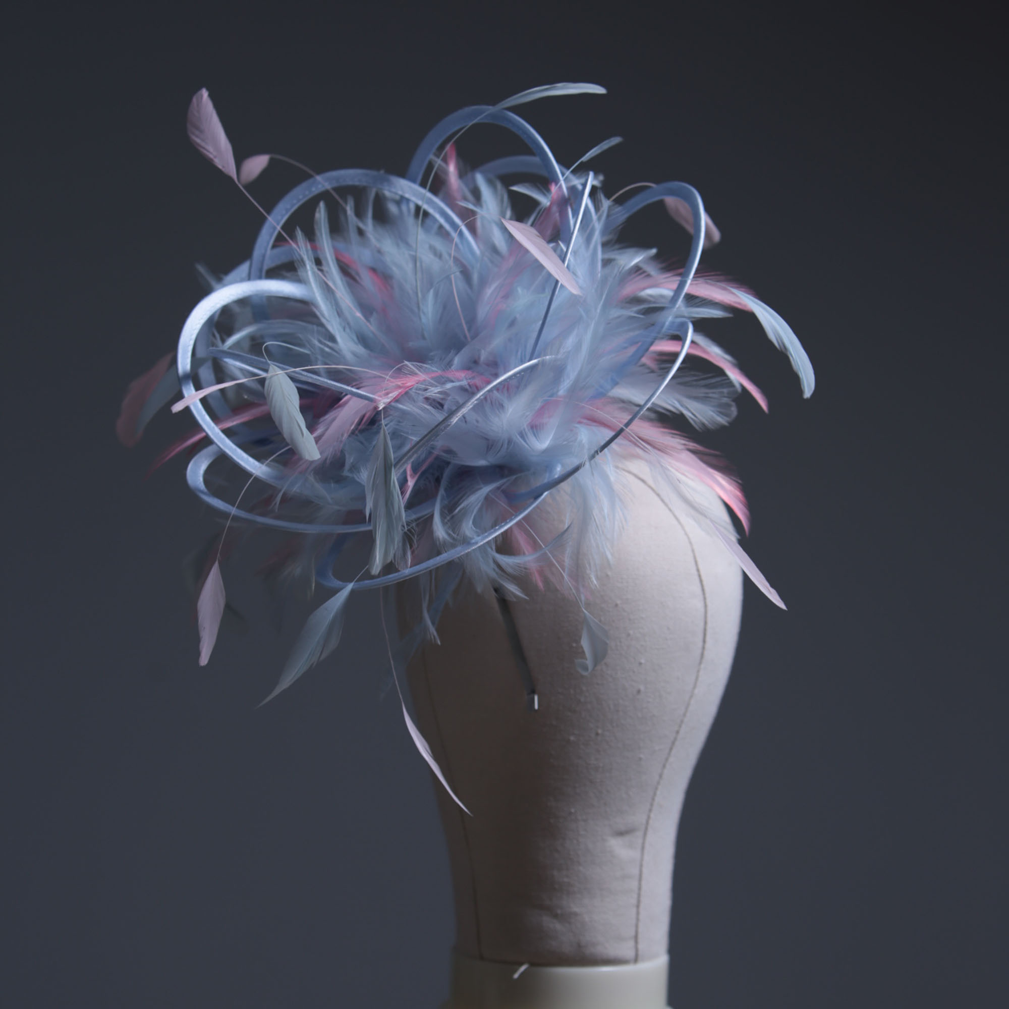 Ladies formal Baby Blue and Baby Pink Medium sized feather and satin fascinator hat. Suitable for a wedding or ladies day at the races