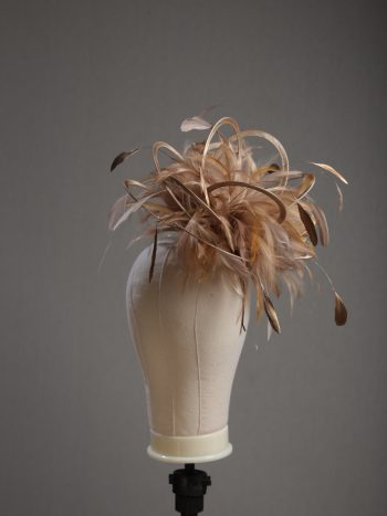 Ladies' formal Taupe Nude and Gold medium feather and satin loop fascinator hat. Suitable for a wedding or ladies' day at the races