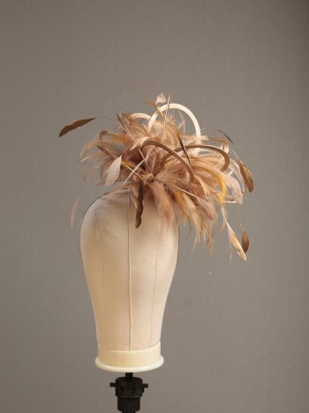 Ladies' formal Taupe Nude and Gold medium feather and satin loop fascinator hat. Suitable for a wedding or ladies' day at the races