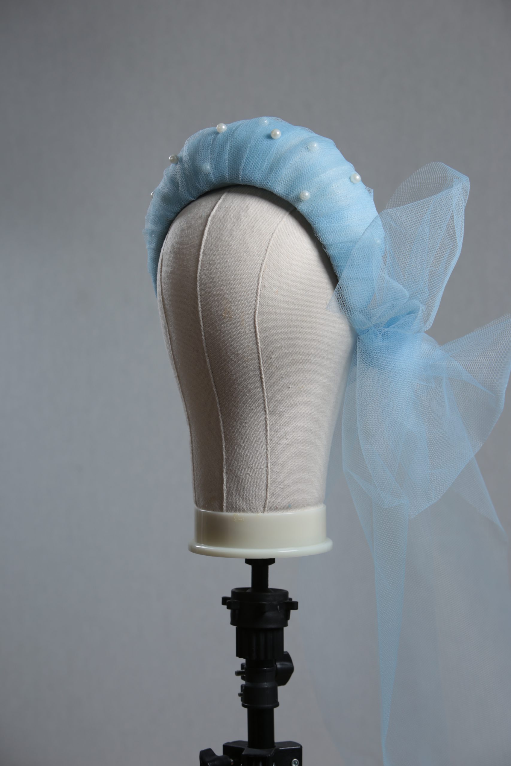 Ladies wedding or races baby blue tulle headband with pearls and bow fascinator