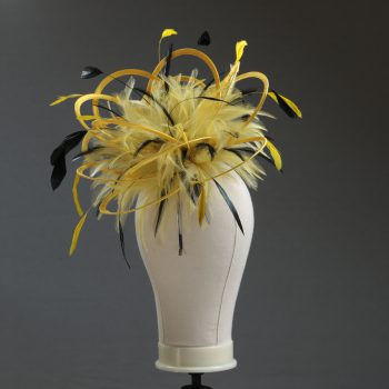 Ladies formal yellow and black medium feather and satin loop fascinator hat. Suitable for a wedding or ladies day at the races