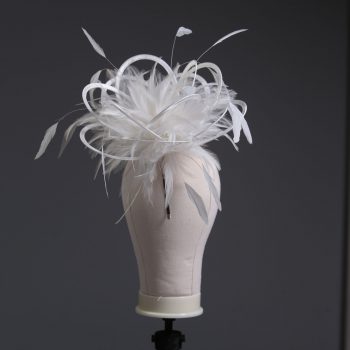 Ladies formal Ivory medium feather and satin loop fascinator hat. Suitable for a wedding or ladies day at the races